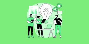 Three people collaborating around a large lightbulb representing an idea, with one holding a chart, another with a tablet, and the third holding documents. Two gears and speech bubbles are in the background, symbolizing teamwork and brainstorming. Credit to Shutterstock.